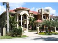 Luxury House Plans 107-1011 color photo.