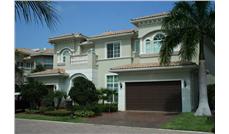 This image shows the front elevation of these Mediterranean Home Plans, Luxury House Plans.