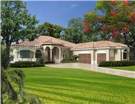 This image shows the front elevation of these Luxury House Plans.