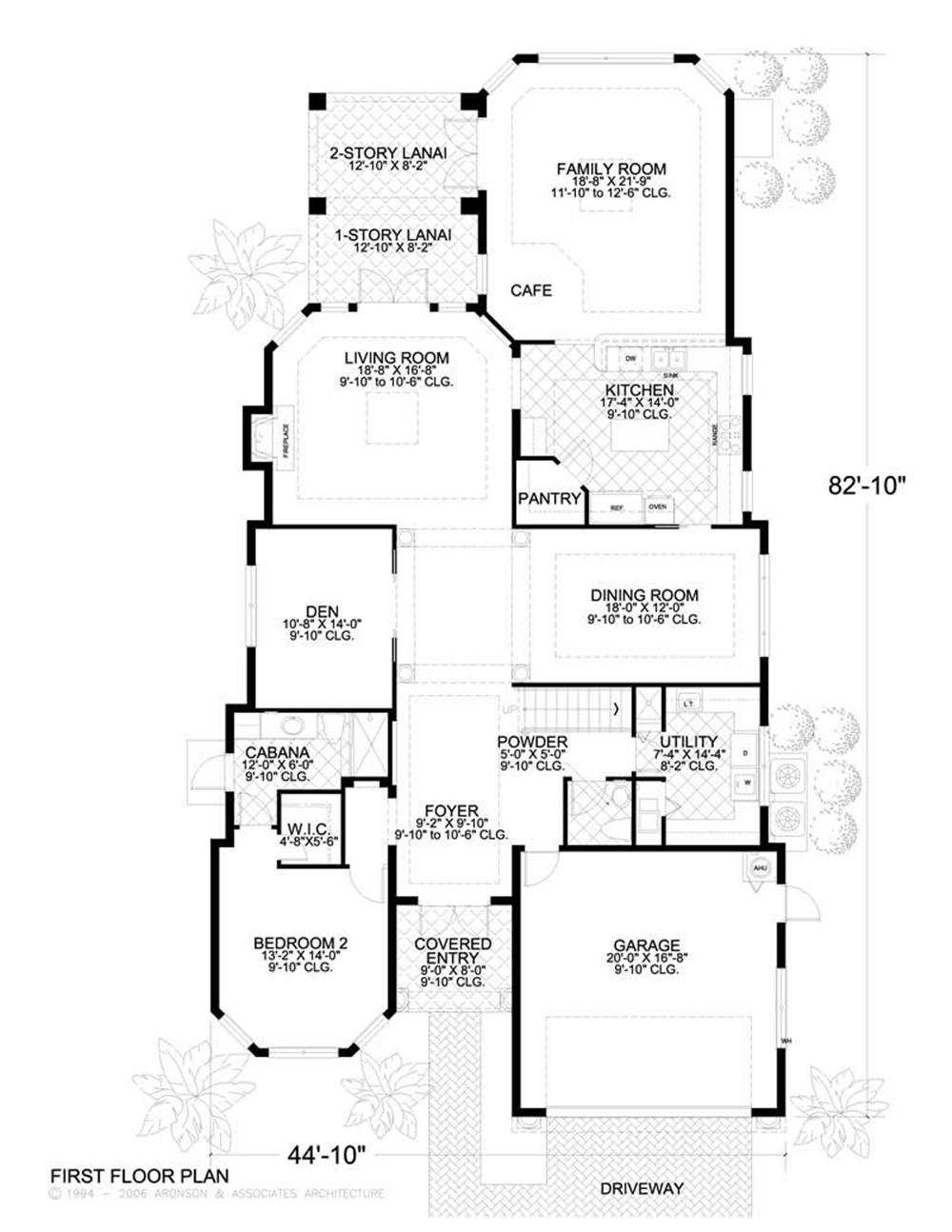 This image shows the living and dining areas of the main floor of the house plan.