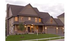 This is a color photo of these Craftsman House Plans.