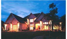 This image shows the front elevation for these European homeplans.