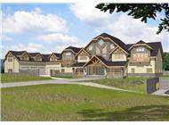 This image shows the front elevation for these Luxury House Plans.
