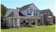 This is a color photo of these Country Homeplans.