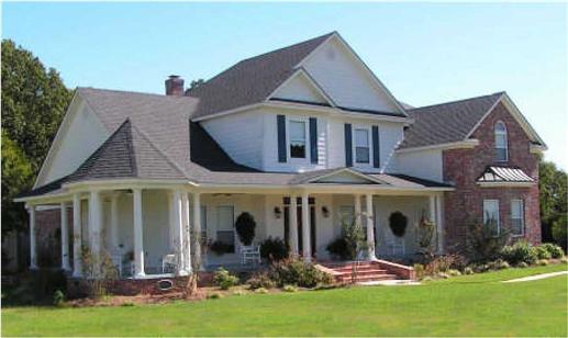 This is a color photo of these Country Homeplans.