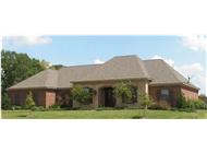 This is a color photo of these French Country House Plans.
