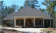 This is a color photo of these Acadian Houseplans.