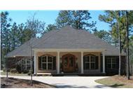 This is a color photo of these Acadian Houseplans.