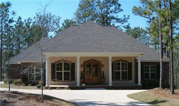 This is a color photo of these Acadian Houseplans.