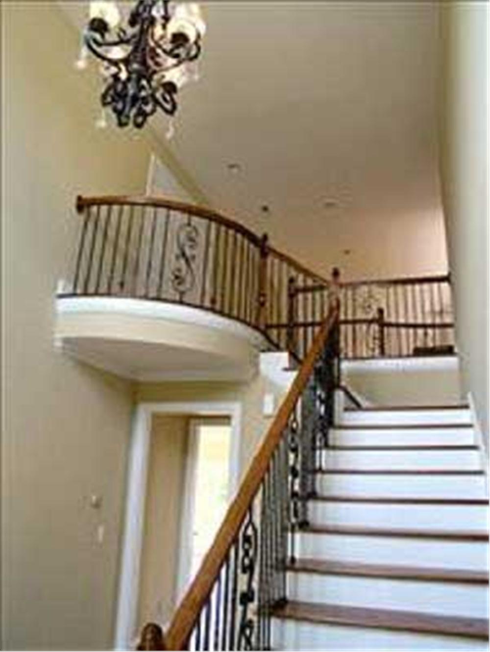 interior photo of plan 9232 foyer stairs