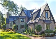 This is a color photo of these Tudor House Plans.