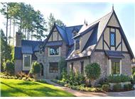This is a color photo of these Tudor House Plans.