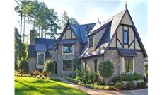This is a color photo of these Tudor House Plans.