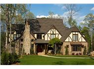 This is a color photo of these Tudor Home Plans.