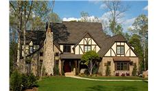 This is a color photo of these Tudor Home Plans.