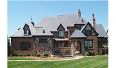 This is a color photo for these Tudor Home Plans.