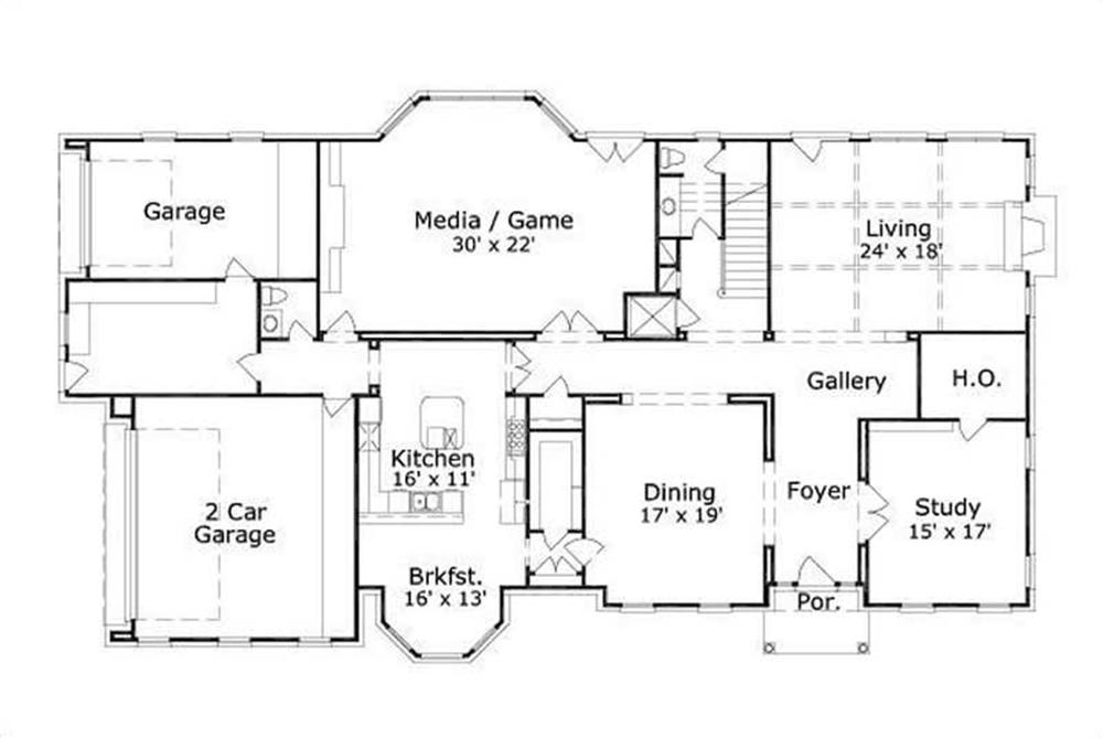 This image shows the living and dining areas along with the 2 car garage.