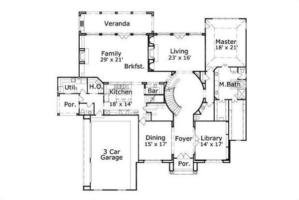 This image shows the living and dining areas along with the 2 car garage.
