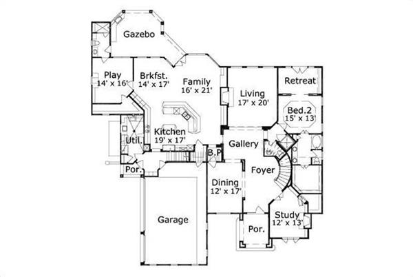 This image shows the living and dining areas along with the garage. 