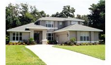 This is a color photo of these Prairie House Plans.