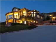 This is a color photo of these Contemporary House Plans.
