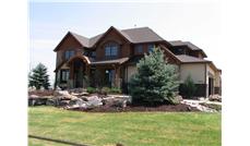 This is the front elevation for these Mountain House Plans.