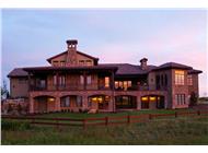 This is the front elevation for these Tuscan House Plans.