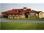 This is a computerized rendering for these Tuscan House Plans.
