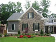 This is a color photo for these Craftsman Home Plans.