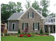This is a color photo for these Craftsman Home Plans.