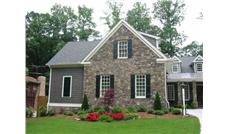 This is a color photo for these Craftsman Home Plans.