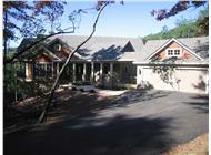 This is a color photo for these Craftsman Home Plans.