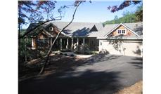 This is a color photo for these Craftsman Home Plans.