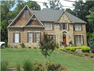 This is a color photo of these Craftsman Home Plans.