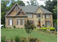 This is a color photo of these Craftsman Home Plans.