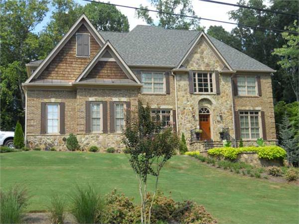This is a color photo of these Craftsman Home Plans.