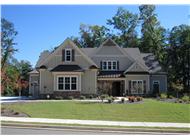This is a color photo for these Craftsman Home Plans.