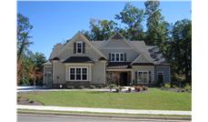 This is a color photo for these Craftsman Home Plans.