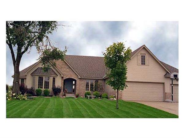 This image shows the front elevation of this set of Ranch Homeplans.
