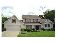 This image shows the front elevation of 1-1/2 Story Houseplans CLS-2000.