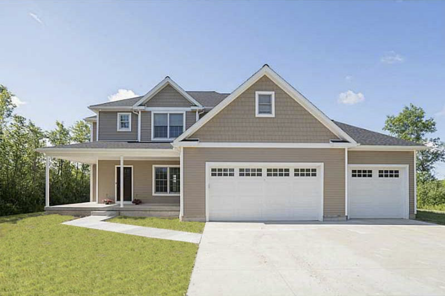 Color photograph of Country home plan (ThePlanCollection: House Plan #100-1159)