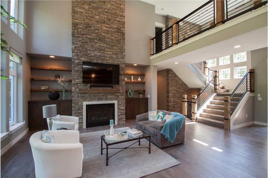 Great Room: Fireplace of this 5-Bedroom,5384 Sq Ft Plan -101-2016