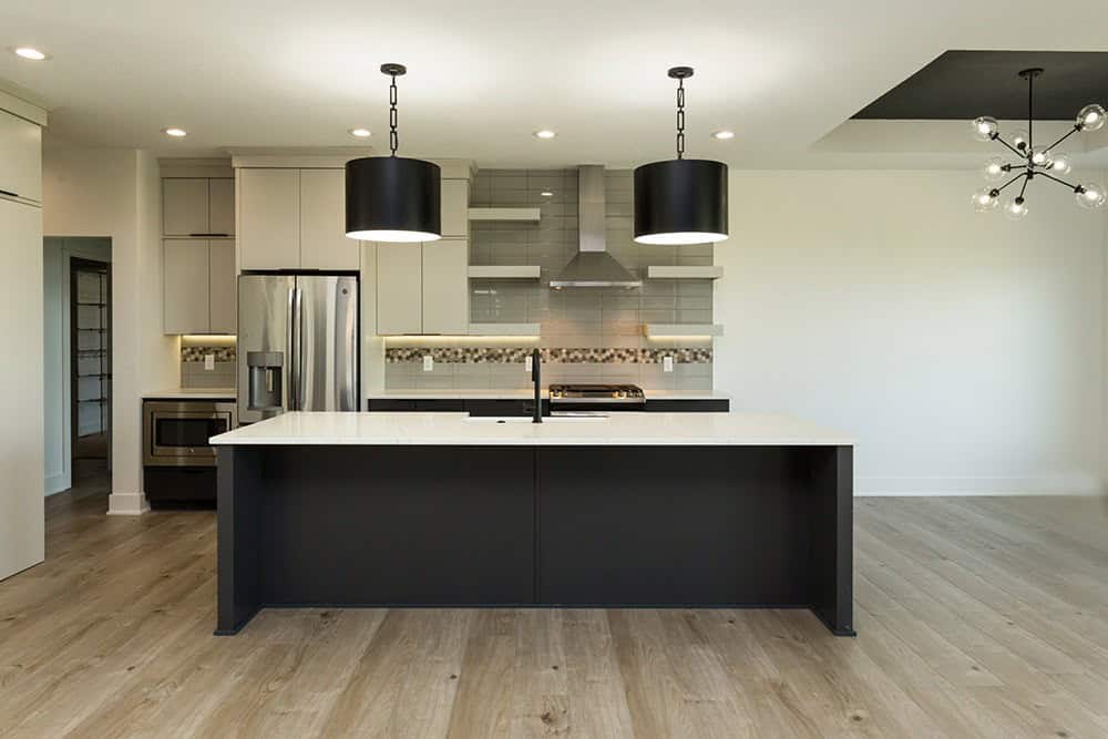 Kitchen: Kitchen Island of this 5-Bedroom,3066 Sq Ft Plan -101-2042