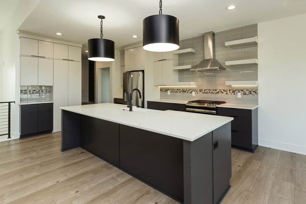 Kitchen: Kitchen Island of this 5-Bedroom,3066 Sq Ft Plan -101-2042