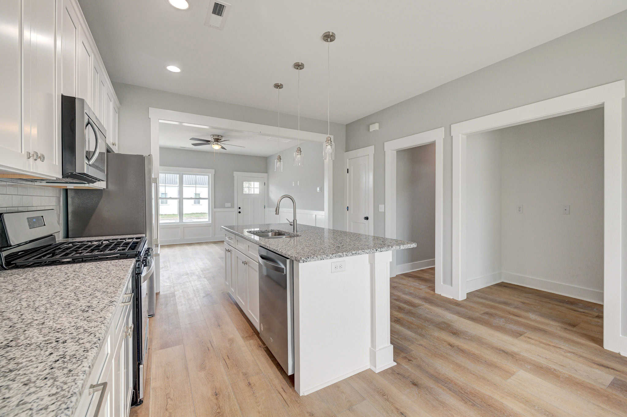 Kitchen: Kitchen Island of this 3-Bedroom,1518 Sq Ft Plan -120-2649