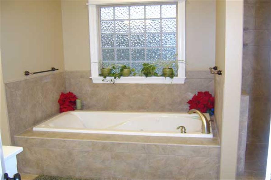 Master Bathroom: Tub of this 4-Bedroom,2500 Sq Ft Plan -141-1097