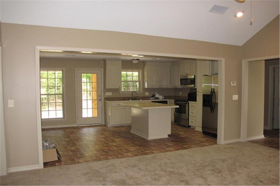 Kitchen and Living Room of this 3-Bedroom,1300 Sq Ft Plan -1300