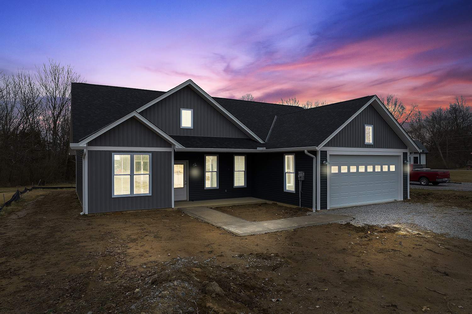 Home at Night of this 3-Bedroom,1416 Sq Ft Plan -142-1420