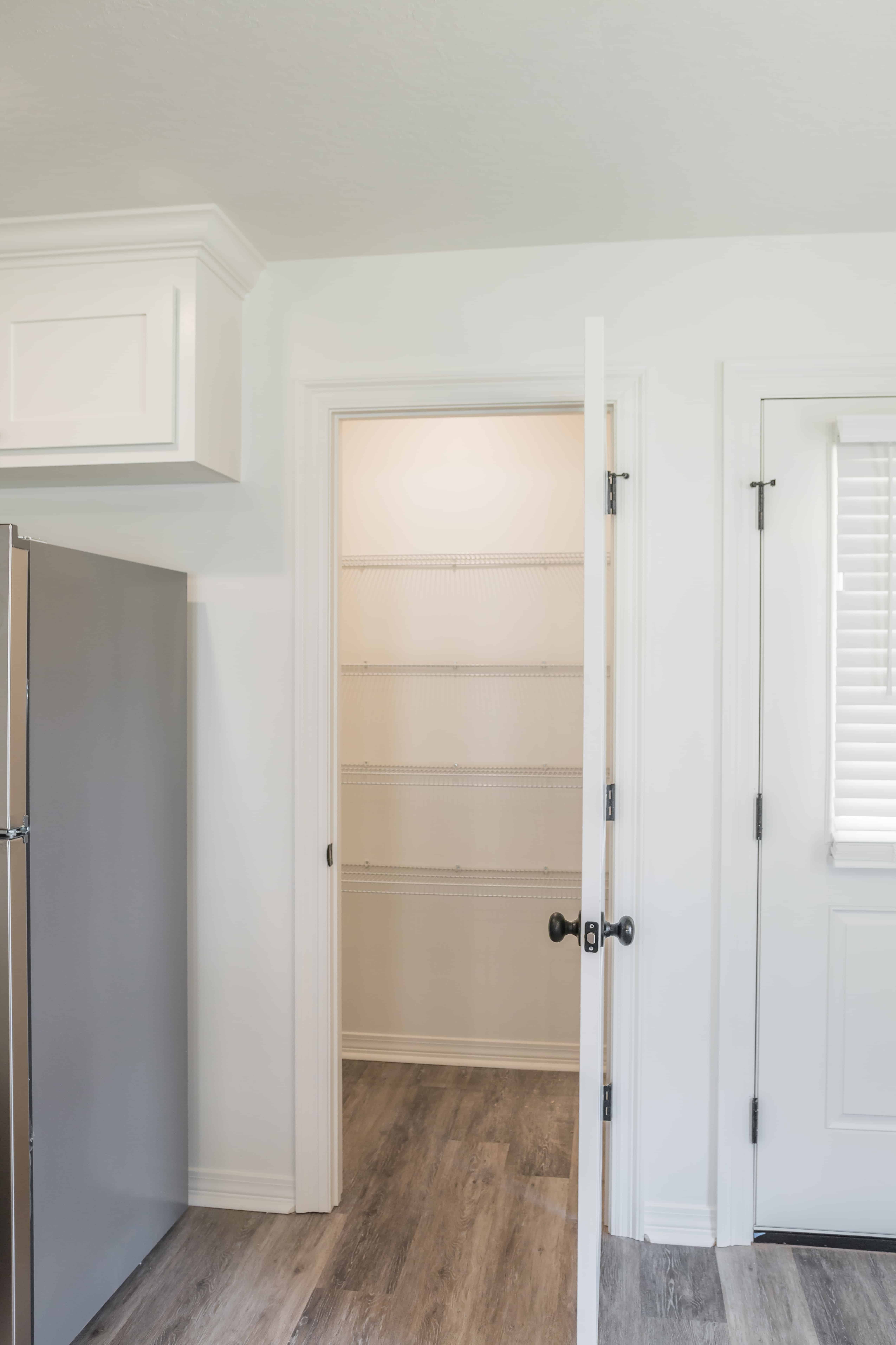 Kitchen: Pantry of this 3-Bedroom,1296 Sq Ft Plan -142-1448