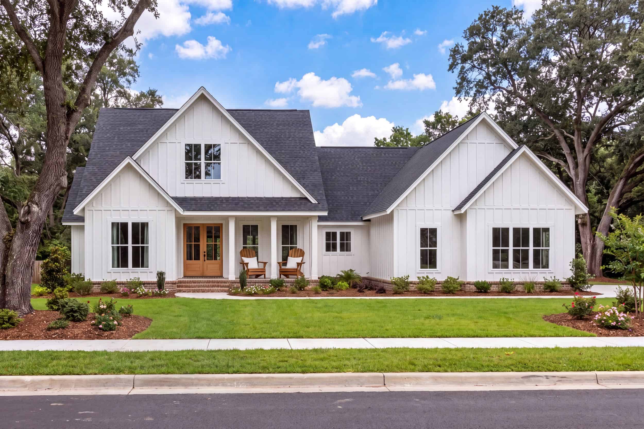 Front elevation of Modern Farmhouse home (ThePlanCollection: House Plan #142-1487)